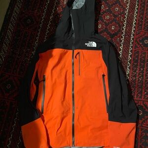 The North Face Vibrant Orange and Black Hooded Jacket